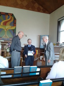 Howard Pawley (L) and Don Dotzert (R) are welcomed into church membership.